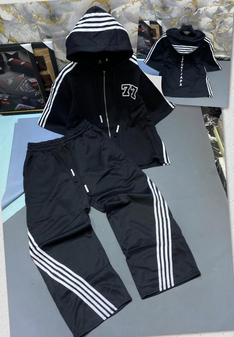 Black zip hoodie and jogger set with white stripes and 77 graphic.