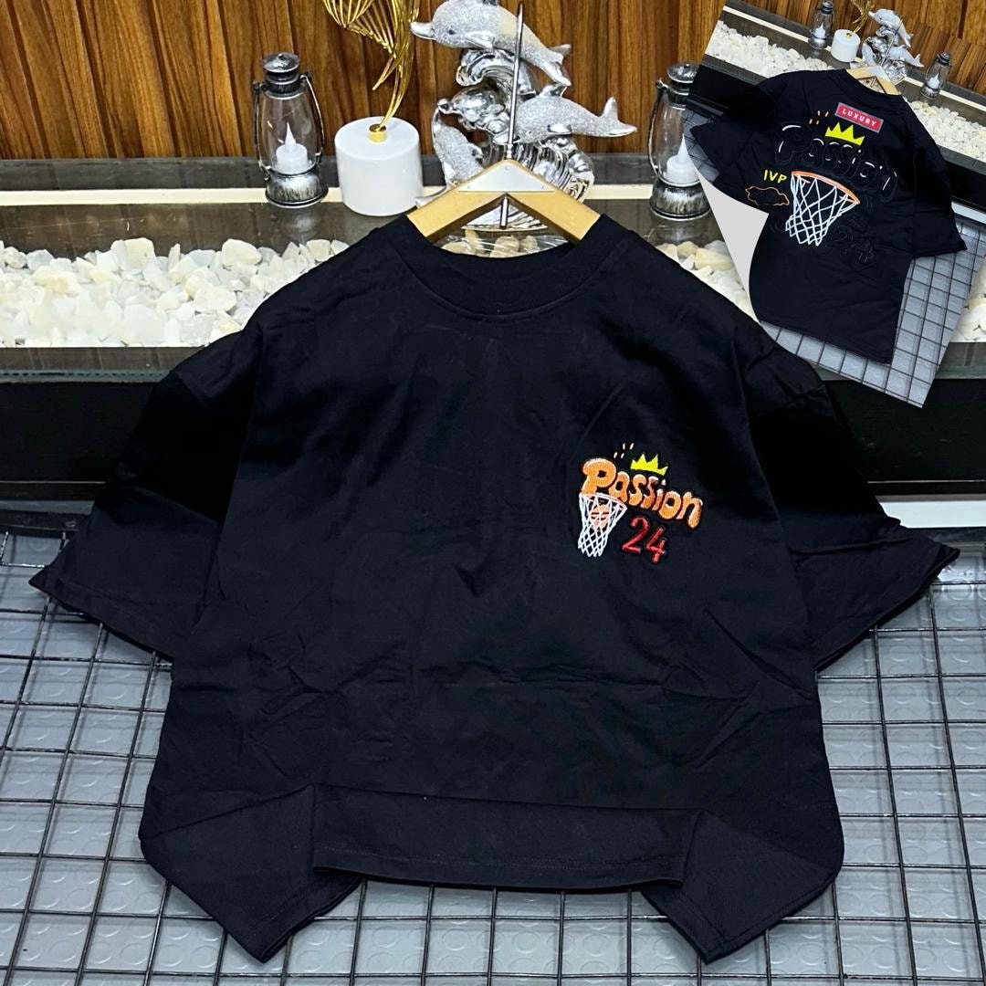Black oversized t-shirt with Passion 24 basketball graphic on chest and back inset.