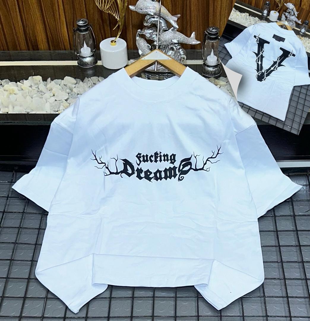White oversized t-shirt with black 'fucking Dreams' branch print on front and inset back V view.