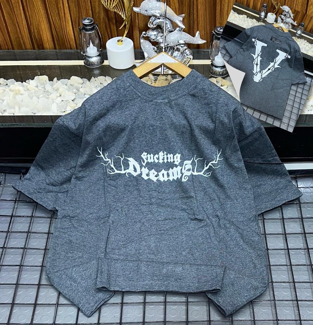 Heather gray oversized t-shirt with white 'fucking Dreams' print on front and inset back V view.