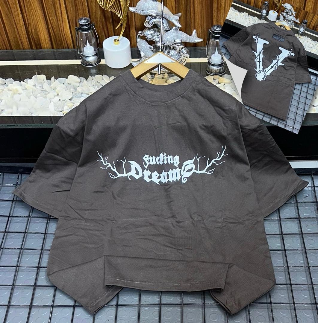 Brown oversized t-shirt with white 'fucking Dreams' branch print on front and inset back V view.