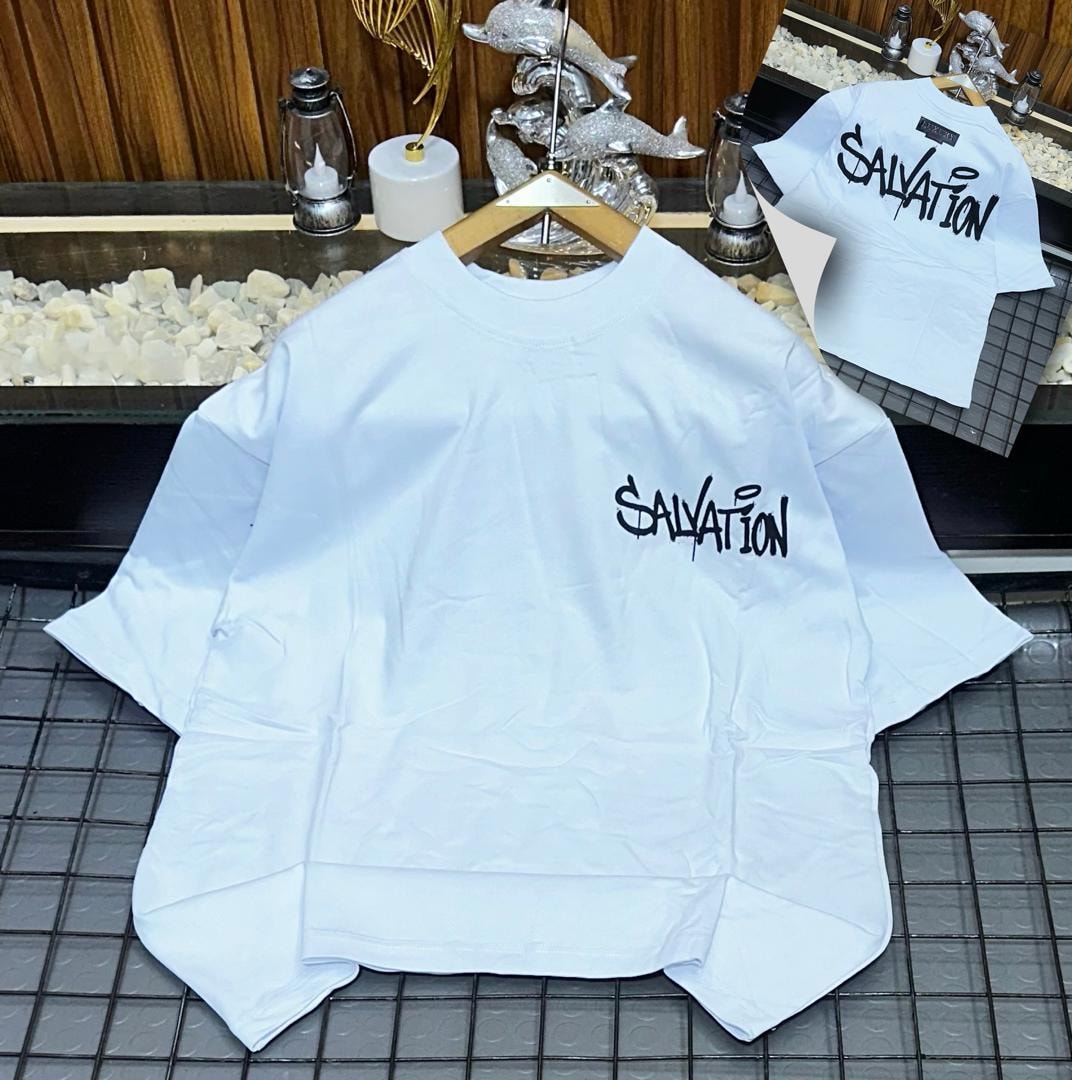 White oversized t-shirt with black Salvation graffiti print on chest and back views.