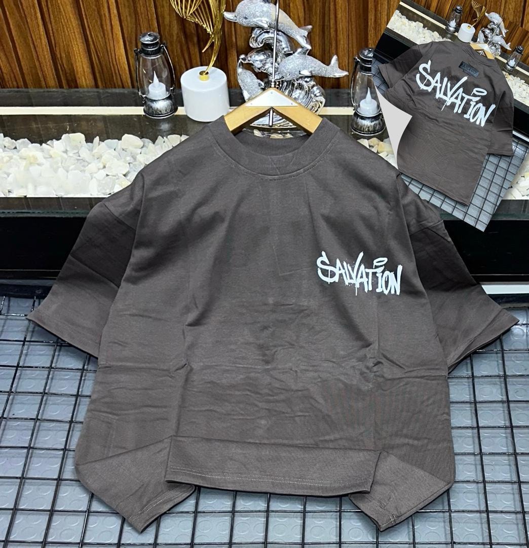 Brown oversized t-shirt with white Salvation graffiti print on chest and back views.