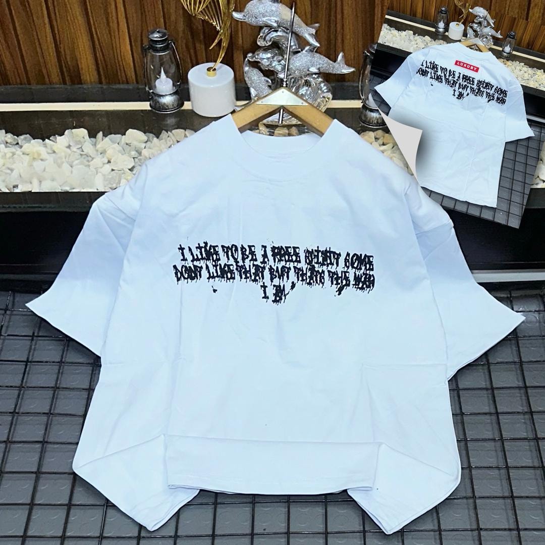 White oversized t-shirt with black dripping quote print on front and back views.