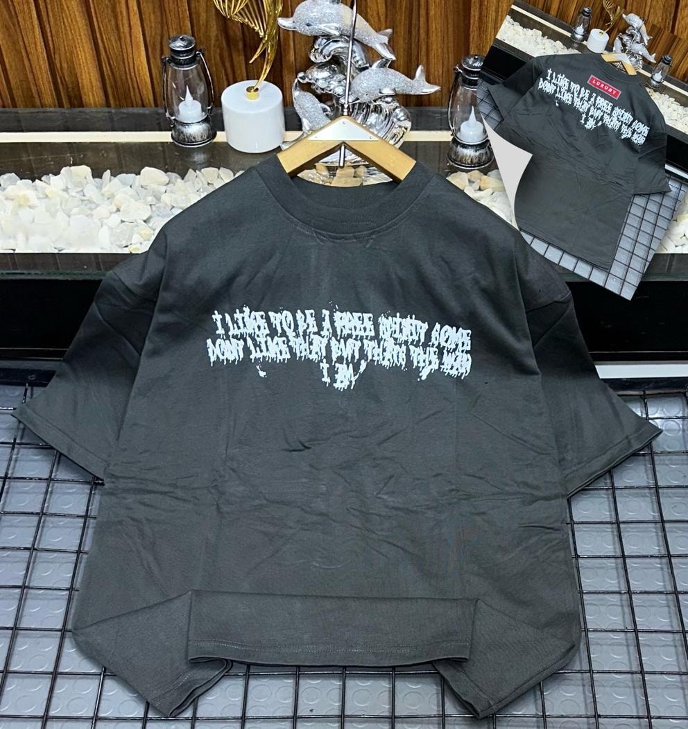 Gray oversized t-shirt with white dripping quote print on front and back views.