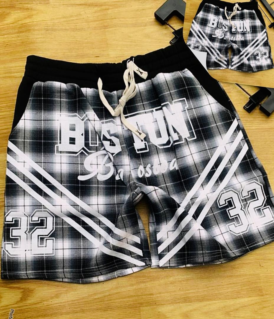 Black and white plaid Boston print shorts with drawstring and 32 details.