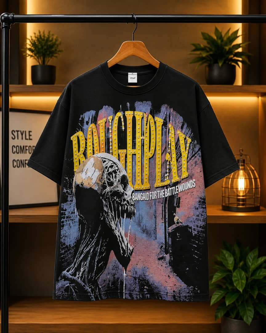 Black oversized t-shirt with roughplay skull and marquee graphic print.