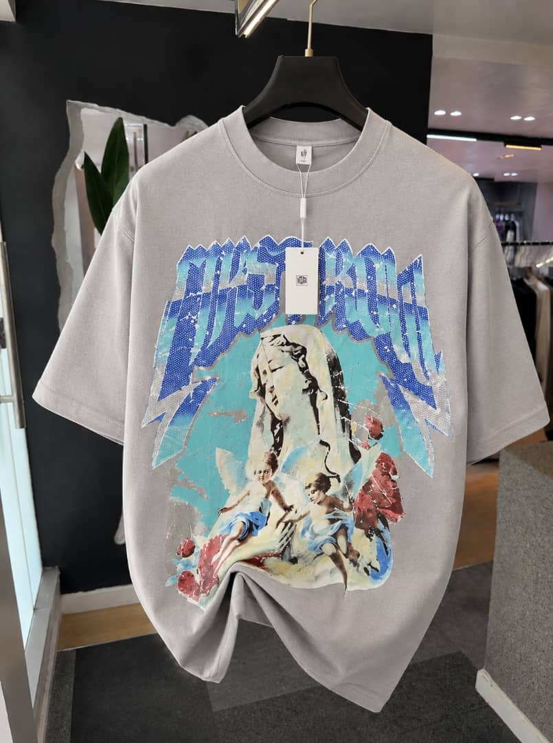 Gray oversized t-shirt with large front graphic print of a female figure, angels and roses.