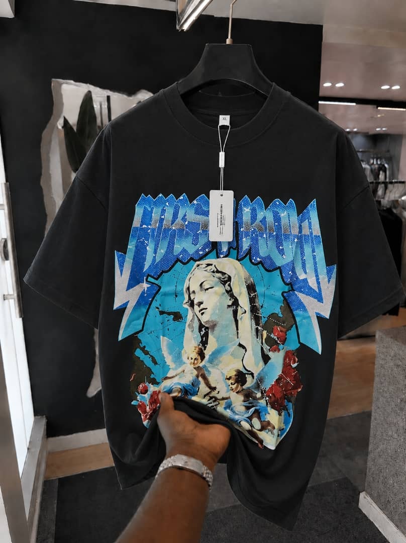 Black oversized t-shirt with large front graphic print of a female figure, angels and roses.