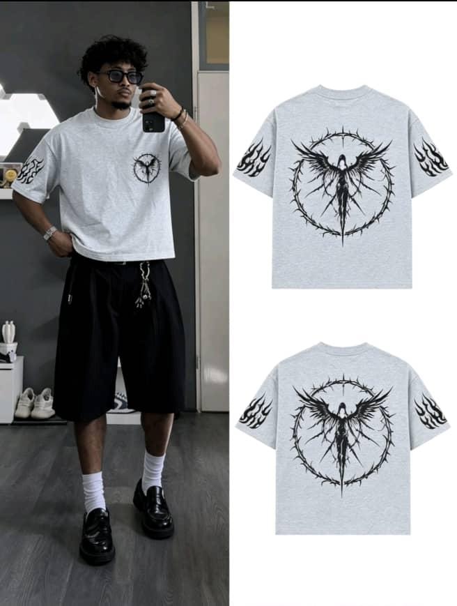 Gray angel in thorns graphic t-shirt worn by model.
