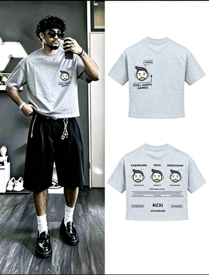 Model wearing gray pixel games graphic t-shirt with front cartoon and detailed back print.
