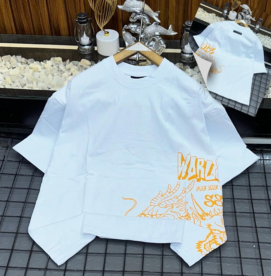 White oversized t-shirt with orange dragon and WARLZ graphic on front, shown on hanger with back inset.