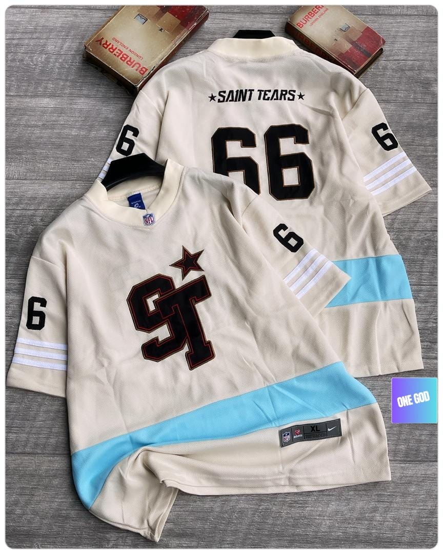Cream mesh jersey with Saint Tears 66 and ST star graphics.