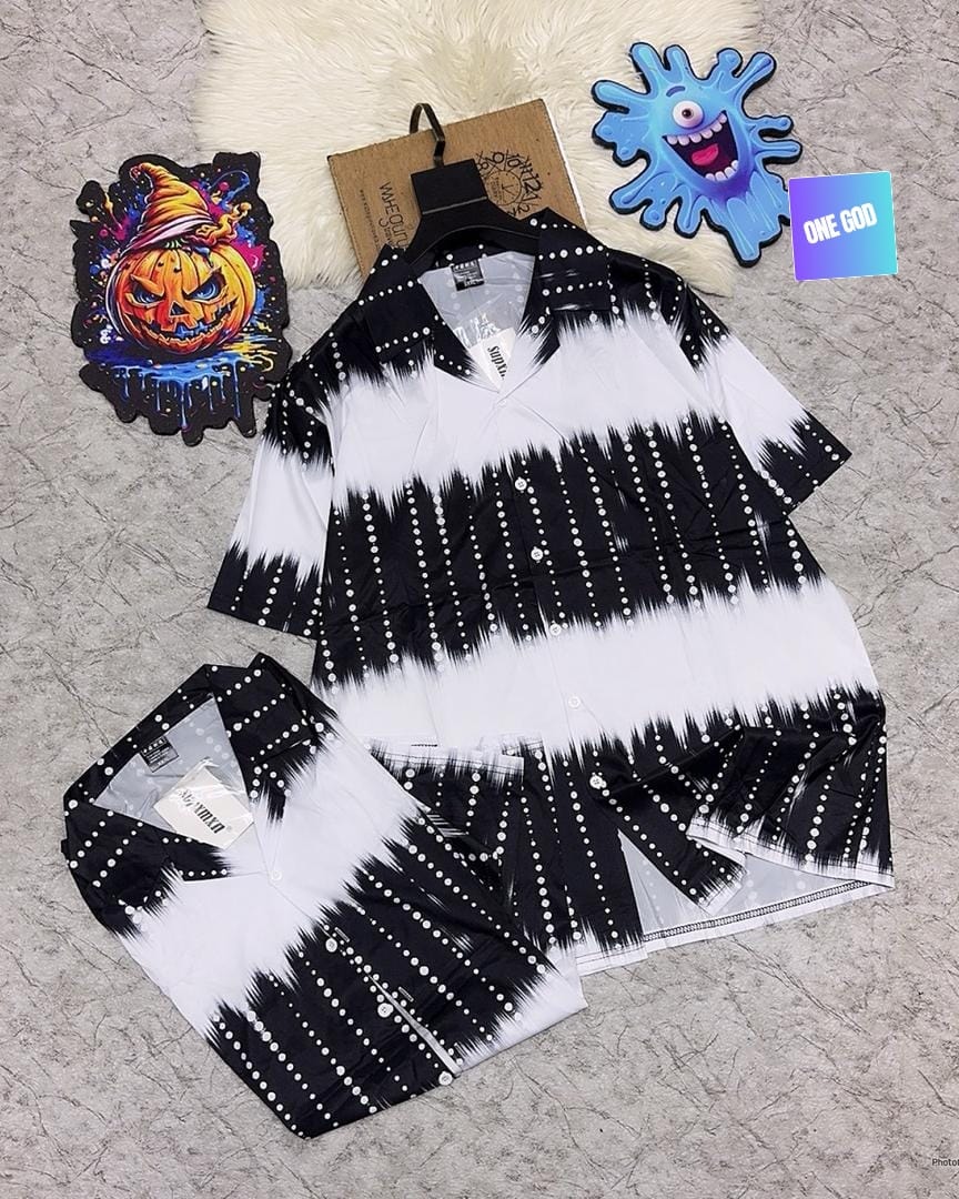 Black and white short sleeve shirt with tie-dye and dotted vertical lines.