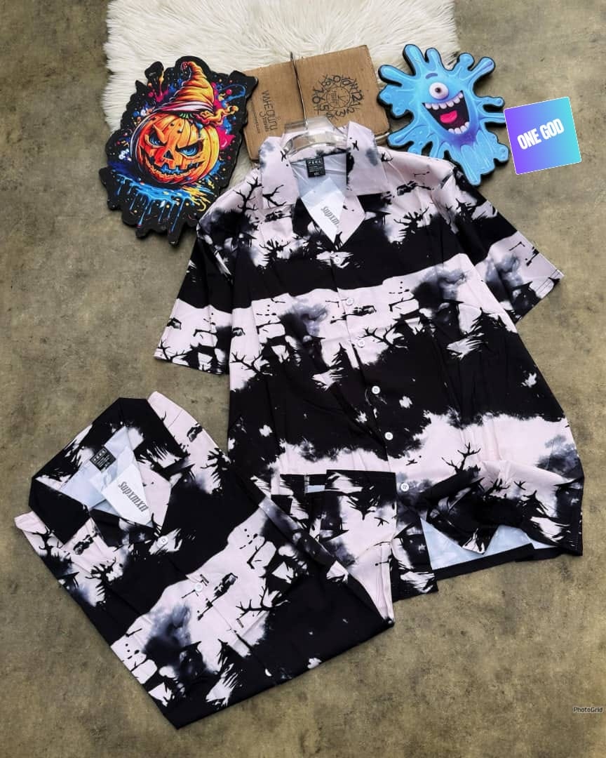 Black pink tie-dye short sleeve shirt with tree motifs, displayed with folded version.