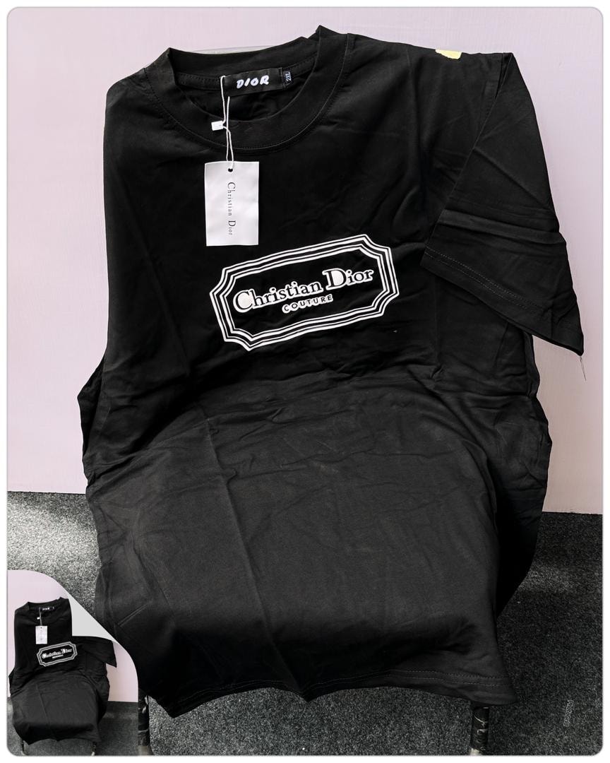 Black Christian Dior Couture logo t-shirt displayed with white tag.