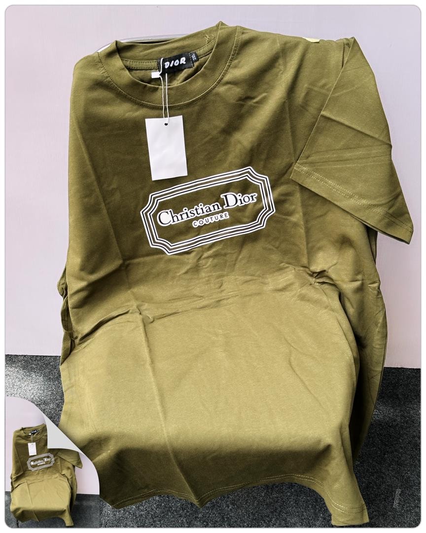 Olive green Christian Dior Couture logo t-shirt on display with neck tag.