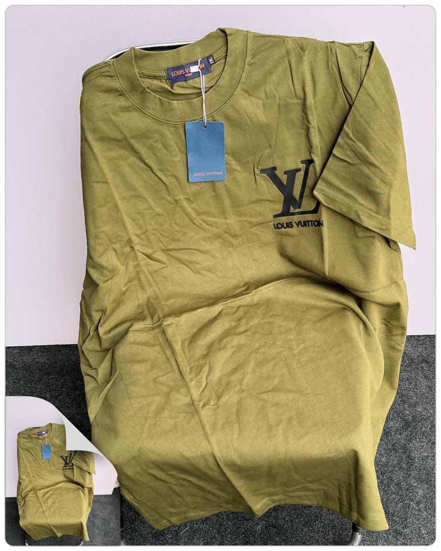Olive Louis Vuitton t-shirt with black LV logo and text, flat lay with tag and folded inset.
