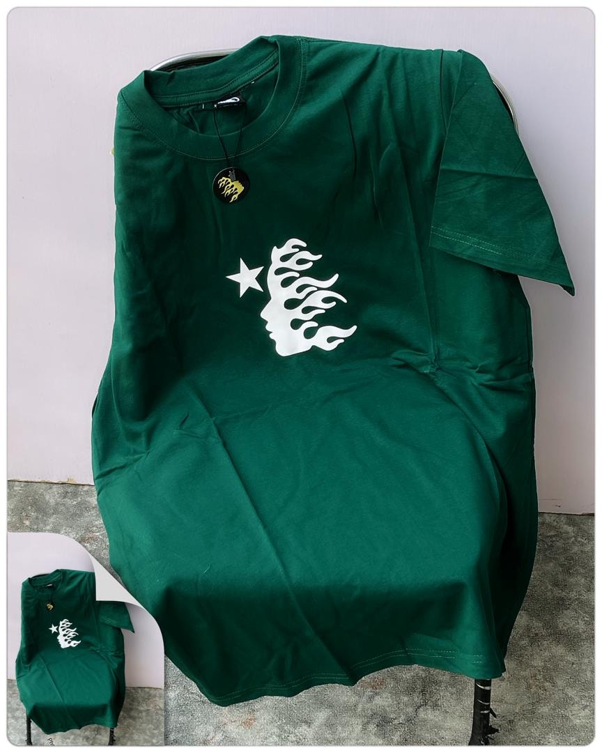 Green t-shirt with white star and flame graphic on chest, flat lay with folded inset.