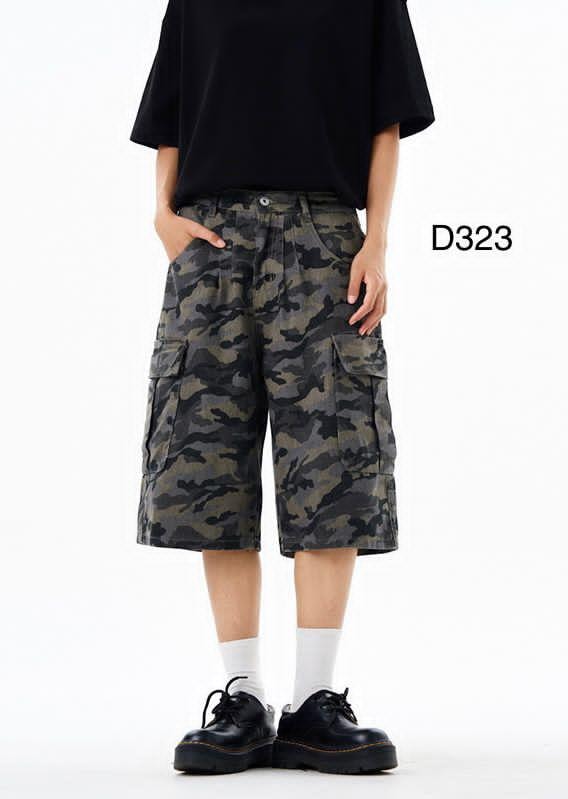 Model wearing green camouflage cargo 3/4 shorts with black t-shirt and shoes.