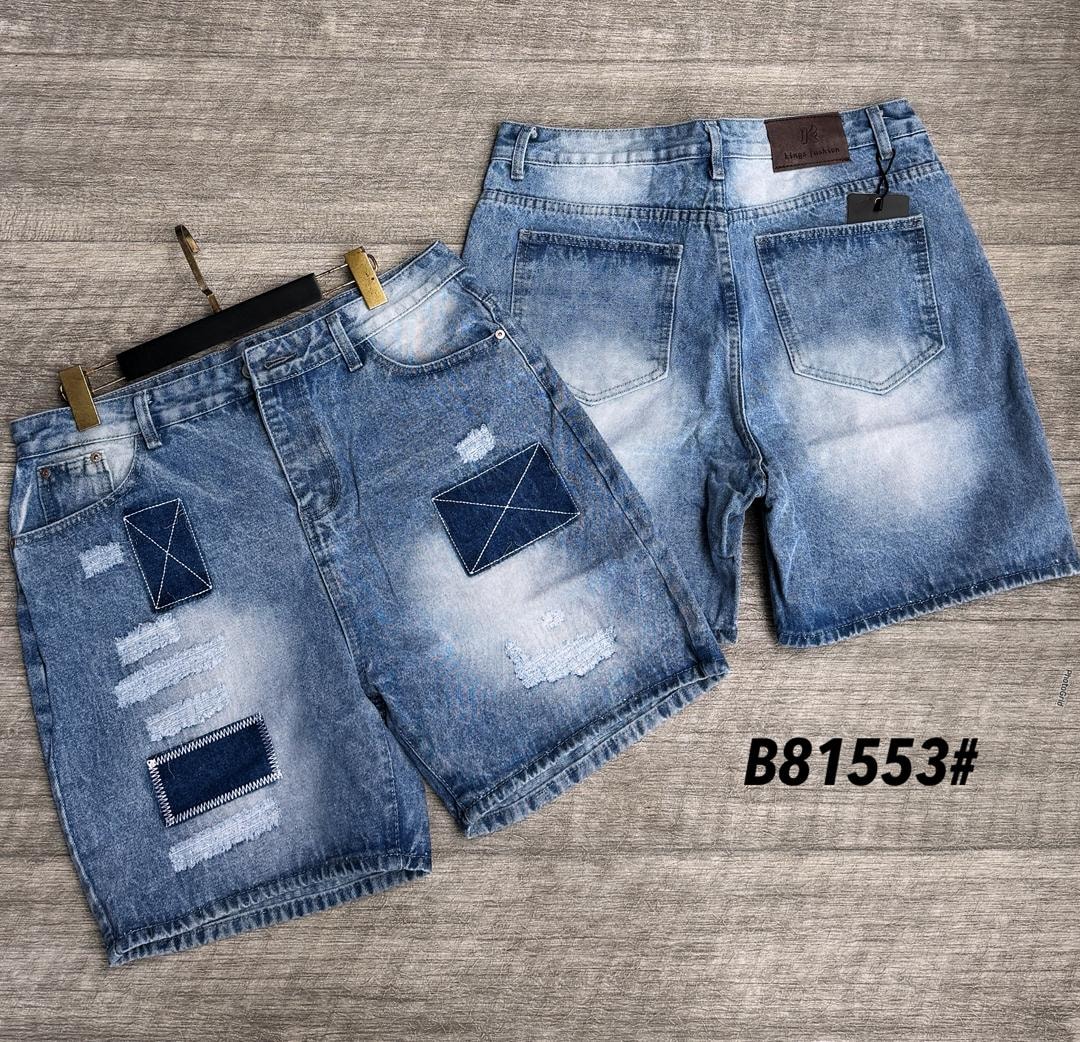 Light blue baggy denim jorts with contrast patches, rips and distressing shown from front and back.