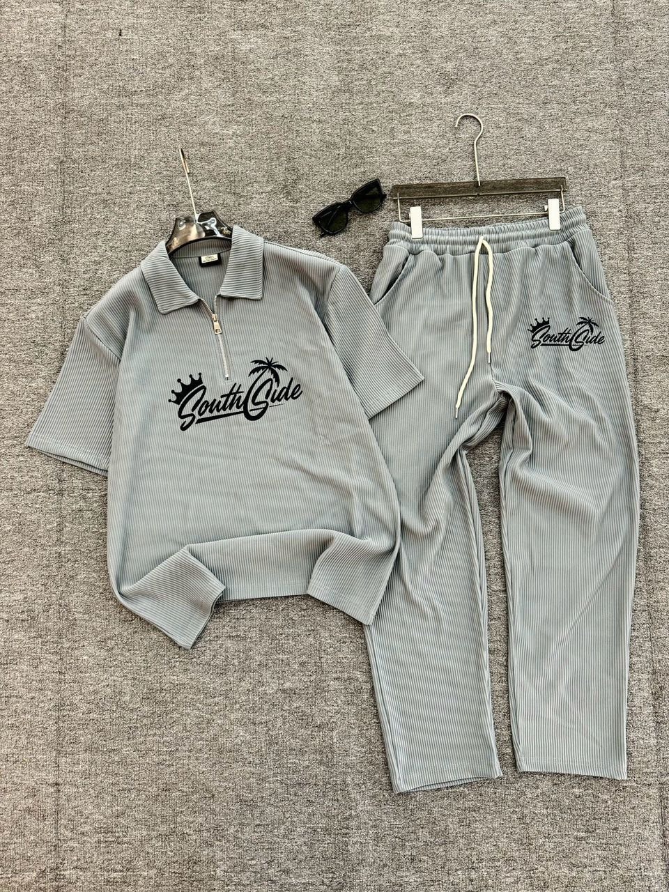 Gray ribbed zip-up polo shirt and jogger pants with black South Side crown and palm logo.