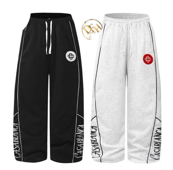 Black and light gray unisex joggers with Casablanca logo and side text print shown side by side.