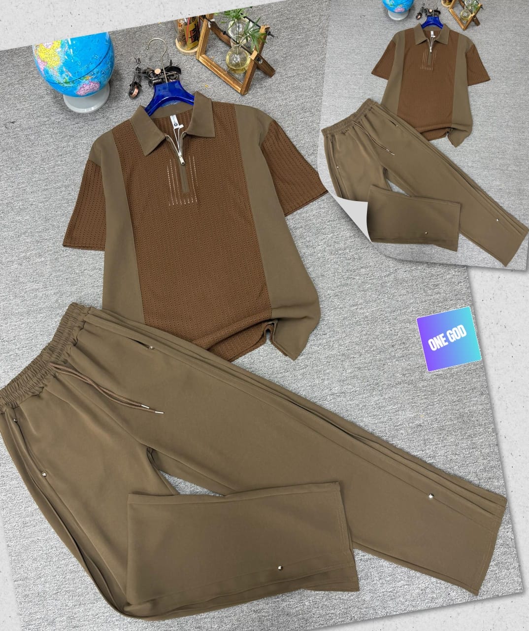 Brown two-piece set with perforated zip polo shirt and matching trousers.