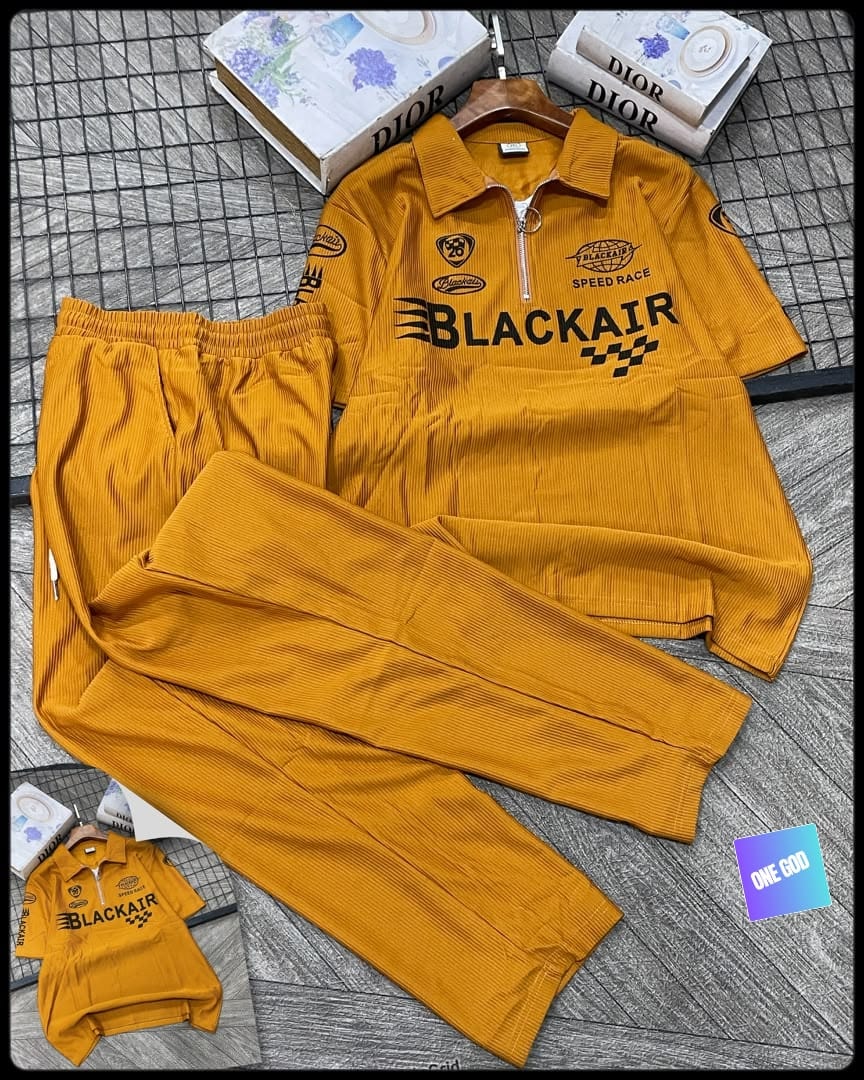 Mustard yellow Blackair graphic ribbed two-piece set flat lay