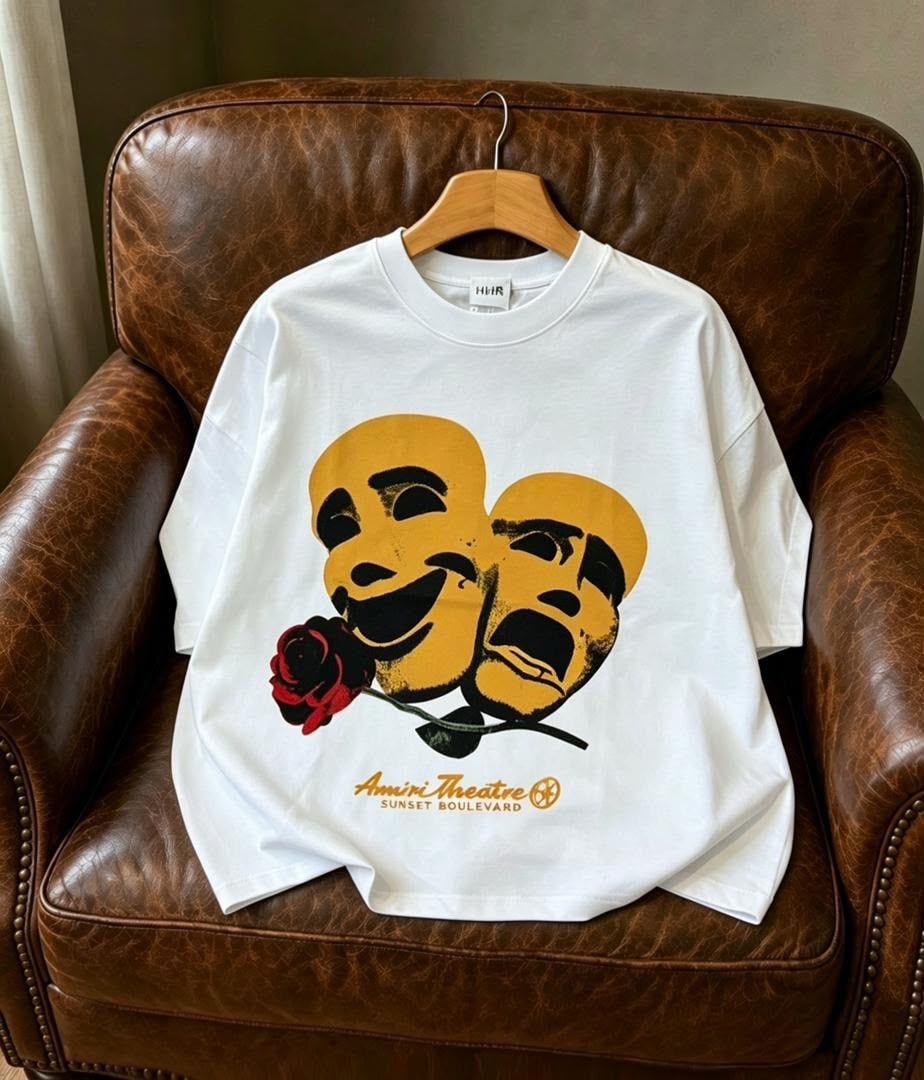 White Amiri Theatre graphic t-shirt flat lay and on model.