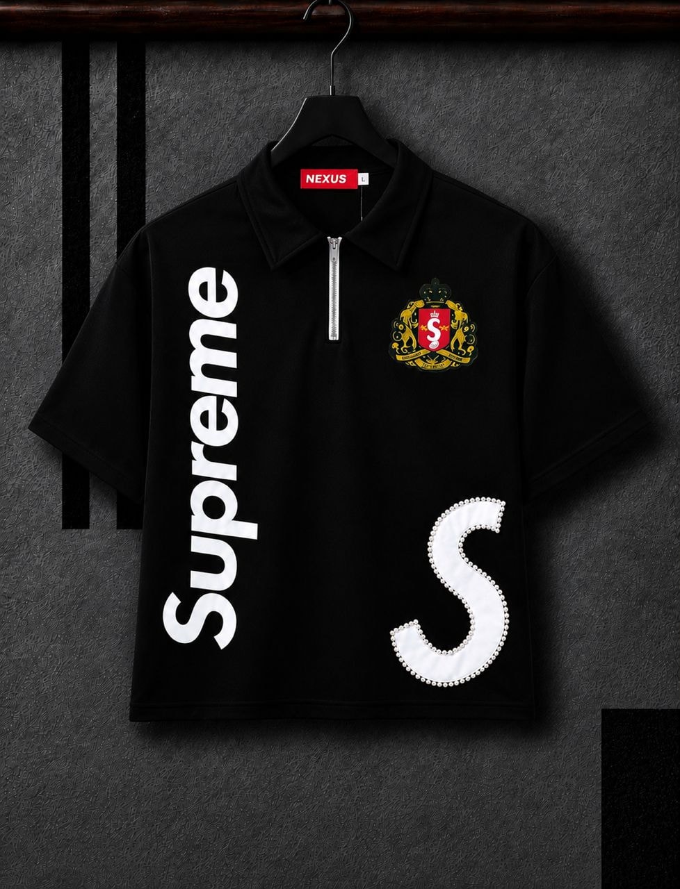 Black half-zip polo shirt with vertical Supreme print, crest logo and white pearl embellished S.