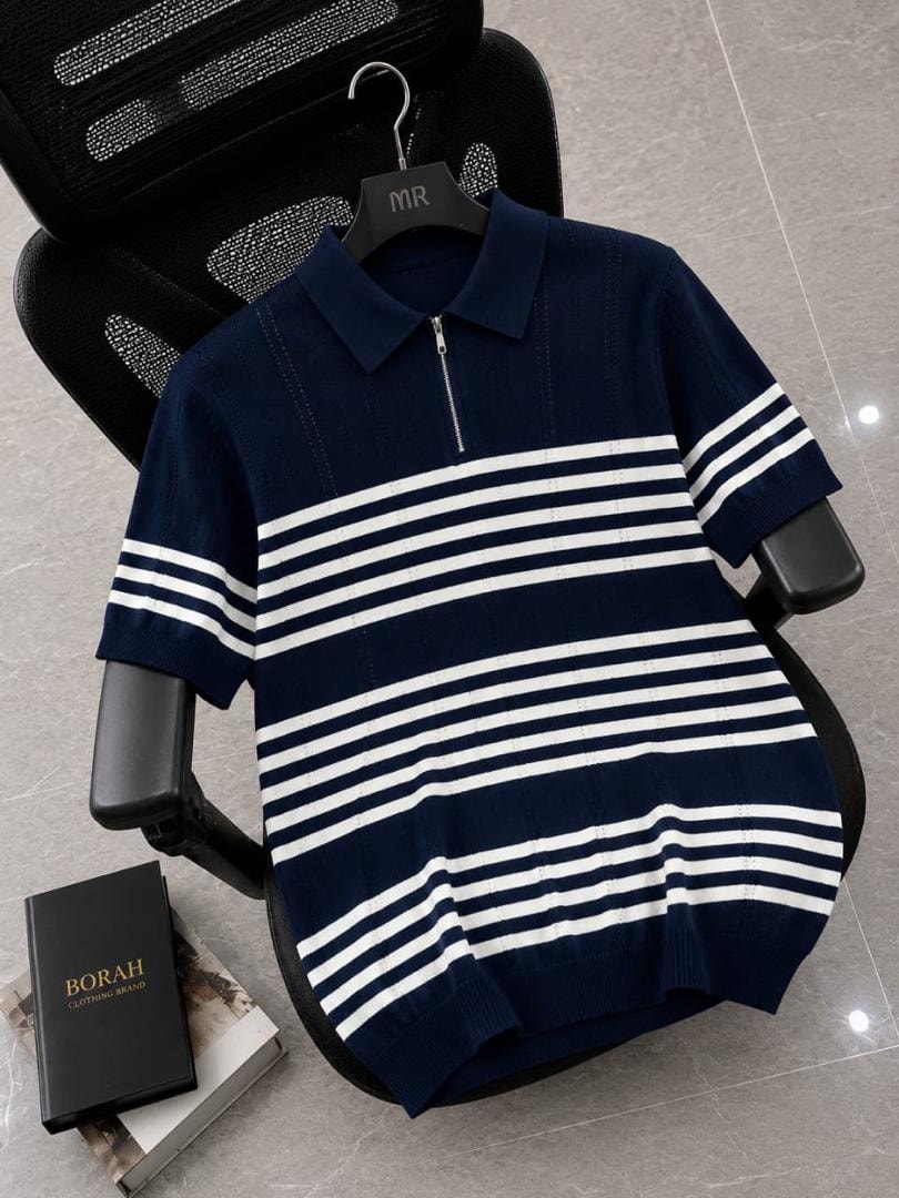 Borah navy horizontal striped quarter-zip polo shirt on black office chair beside brand box.