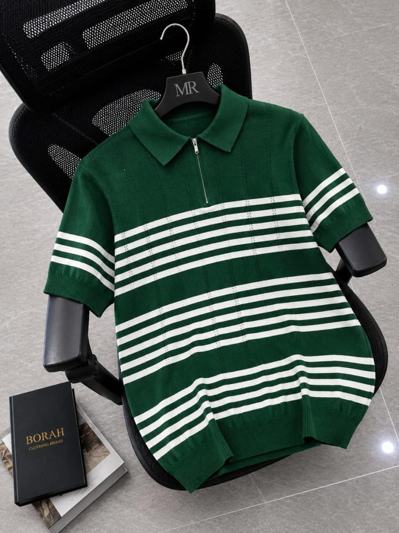 Borah green horizontal striped quarter-zip polo shirt on black office chair beside brand box.
