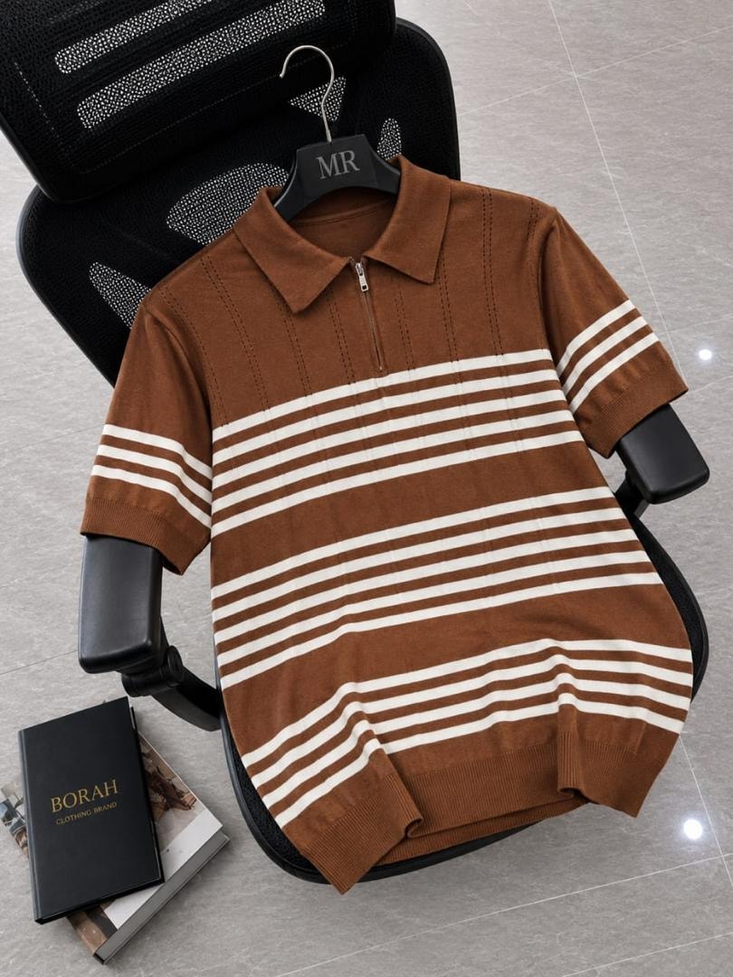 Borah brown horizontal striped quarter-zip polo shirt on black office chair beside brand box.