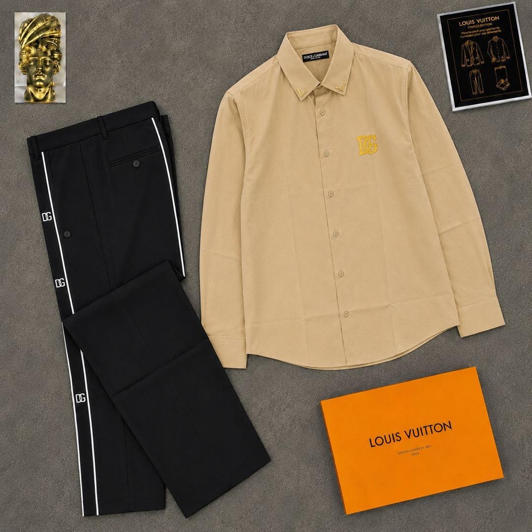 Beige long sleeve DG logo shirt paired with black striped trousers and orange box.