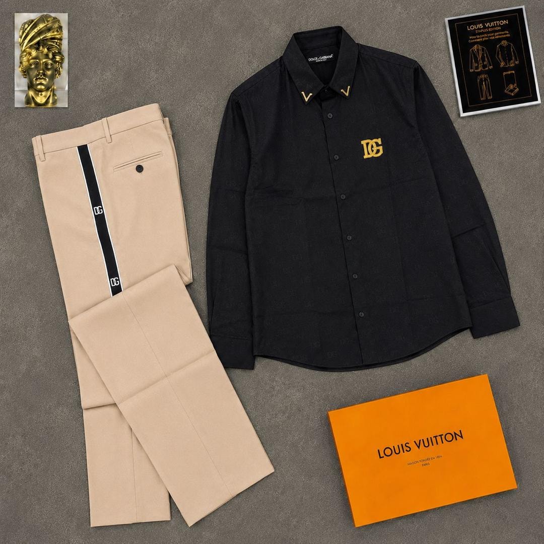Black long sleeve DG logo shirt paired with beige striped trousers and orange box.