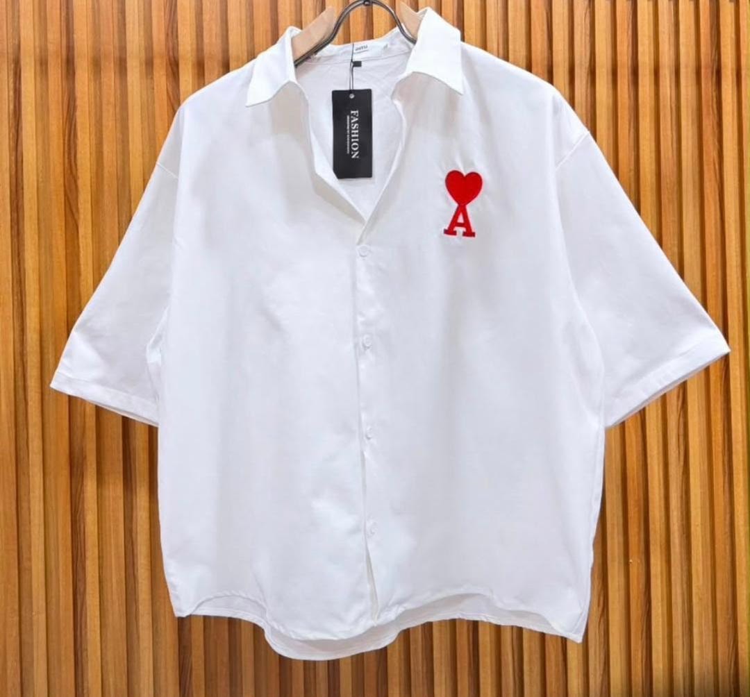 White short sleeve shirt with red heart and A embroidery on chest.