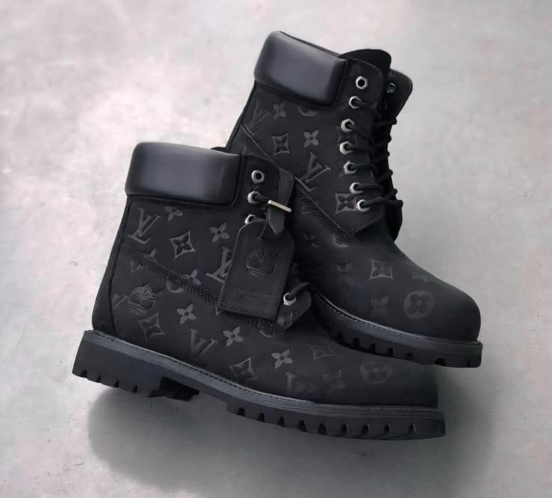 Black Timberland boots with LV pattern and tags shown from multiple angles on gray background.