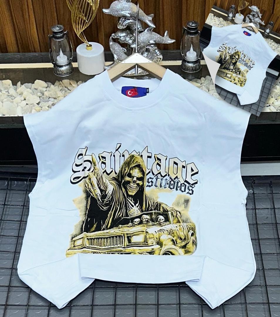 White oversized armless top with Saintage Studios grim reaper car graphic.