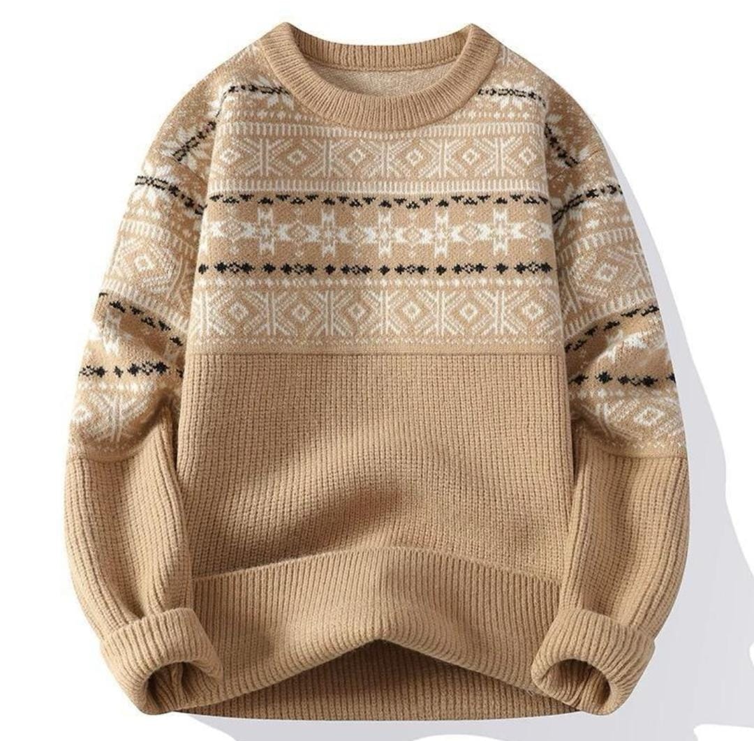 Beige knit sweatshirt with white and black geometric patterns laid flat.