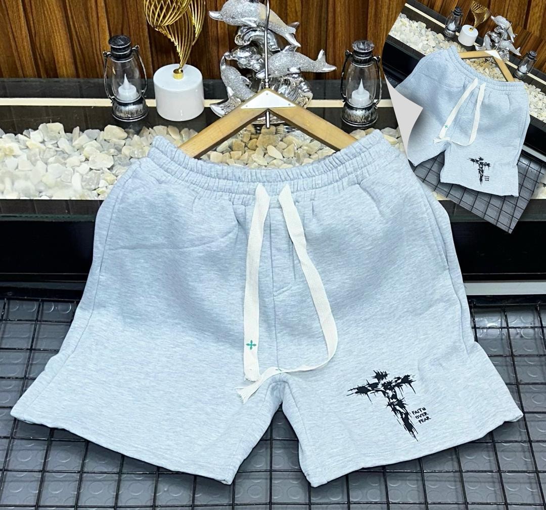 Light gray fleece shorts with black cross and Faith Over Fear print.