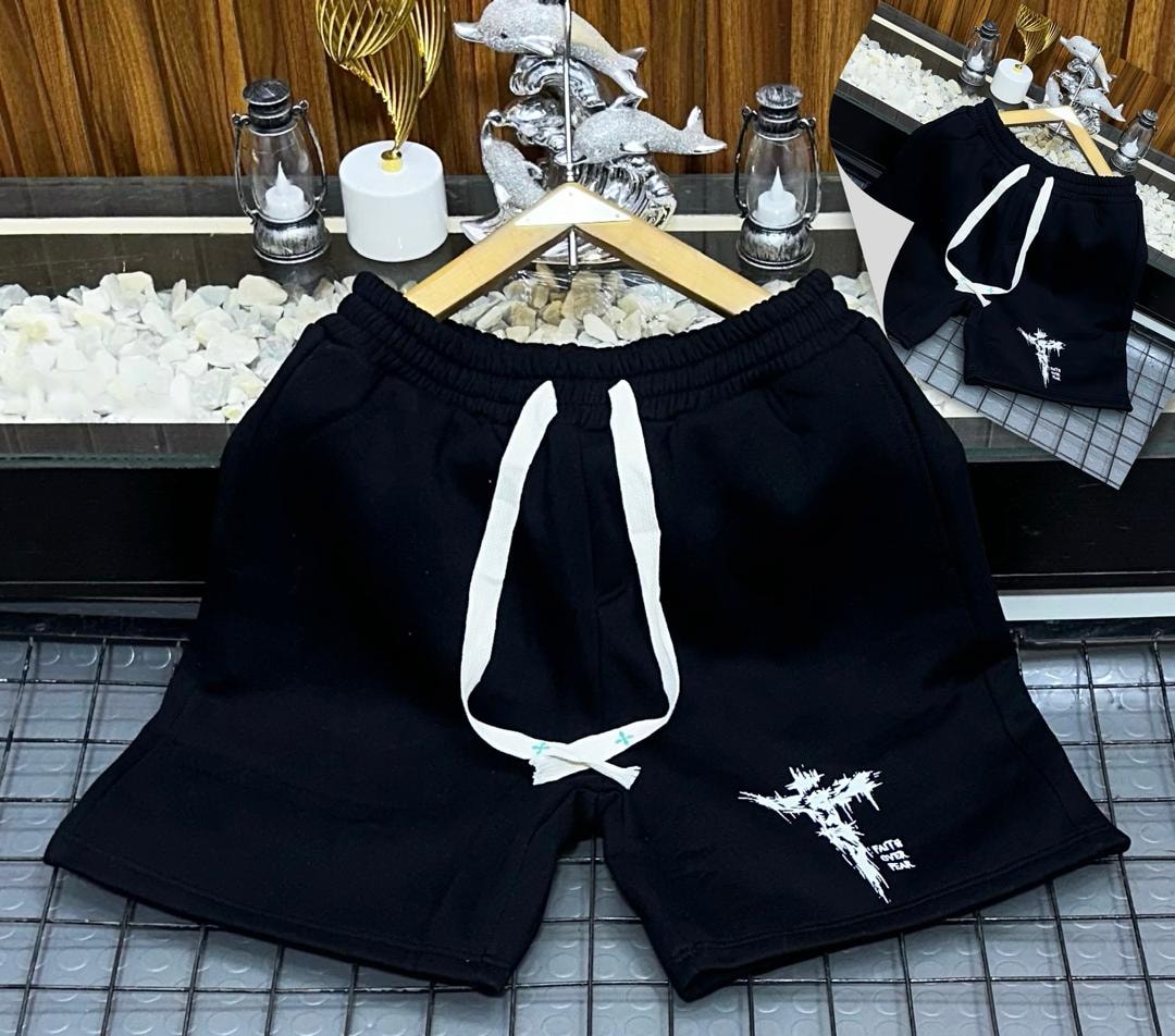 Black fleece shorts with white cross and Faith Over Fear print.