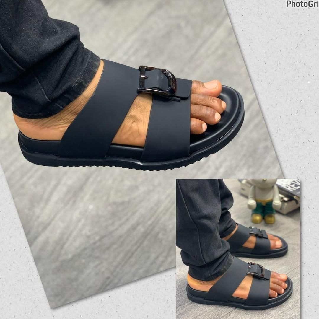 Black double strap sandals with buckle worn on a person's foot in two views.