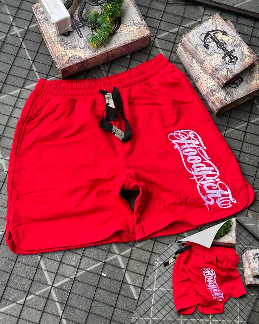 Red HoodRich fleece shorts with white embroidery and drawstring waist.