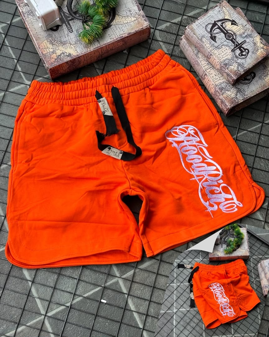 Orange HoodRich fleece shorts with white embroidery and drawstring waist.