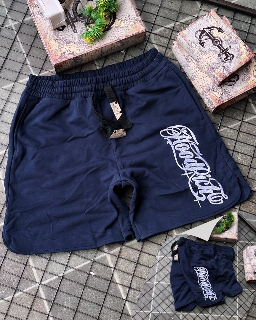 Navy HoodRich fleece shorts with white embroidery and drawstring waist.