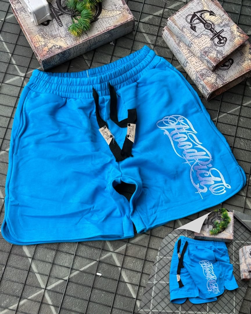 Blue HoodRich fleece shorts with white embroidery and drawstring waist.