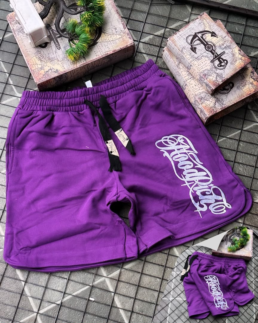 Purple HoodRich fleece shorts with white embroidery and drawstring waist.