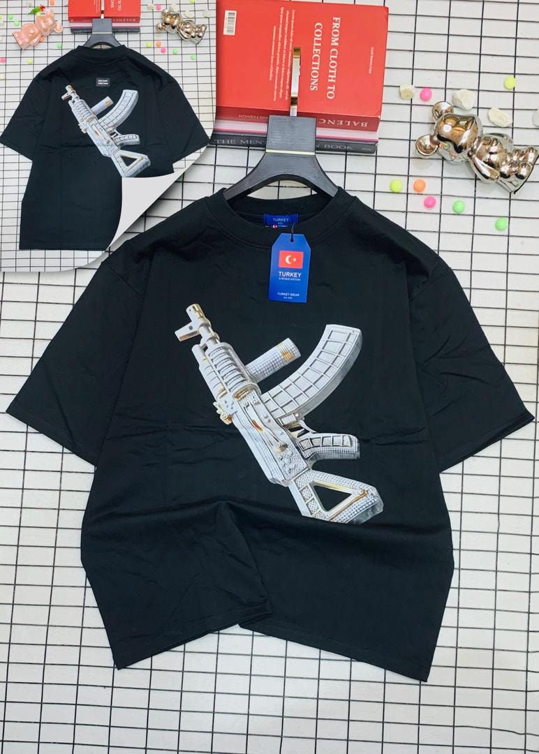 Black oversized t-shirt with jeweled AK-47 graphic on front and back.