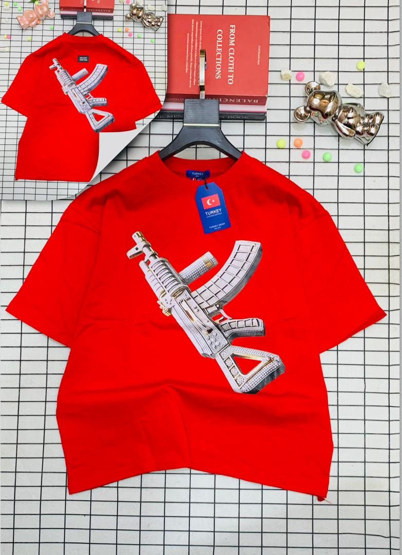 Red oversized t-shirt with jeweled AK-47 graphic on front and back.